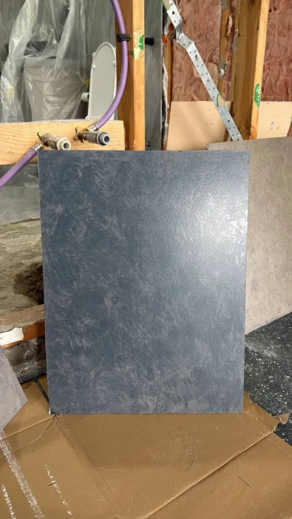A premium custom charcoal marble design painting sample for a luxury feature wall in Melbourne CBD by EQ Painting Solutions.