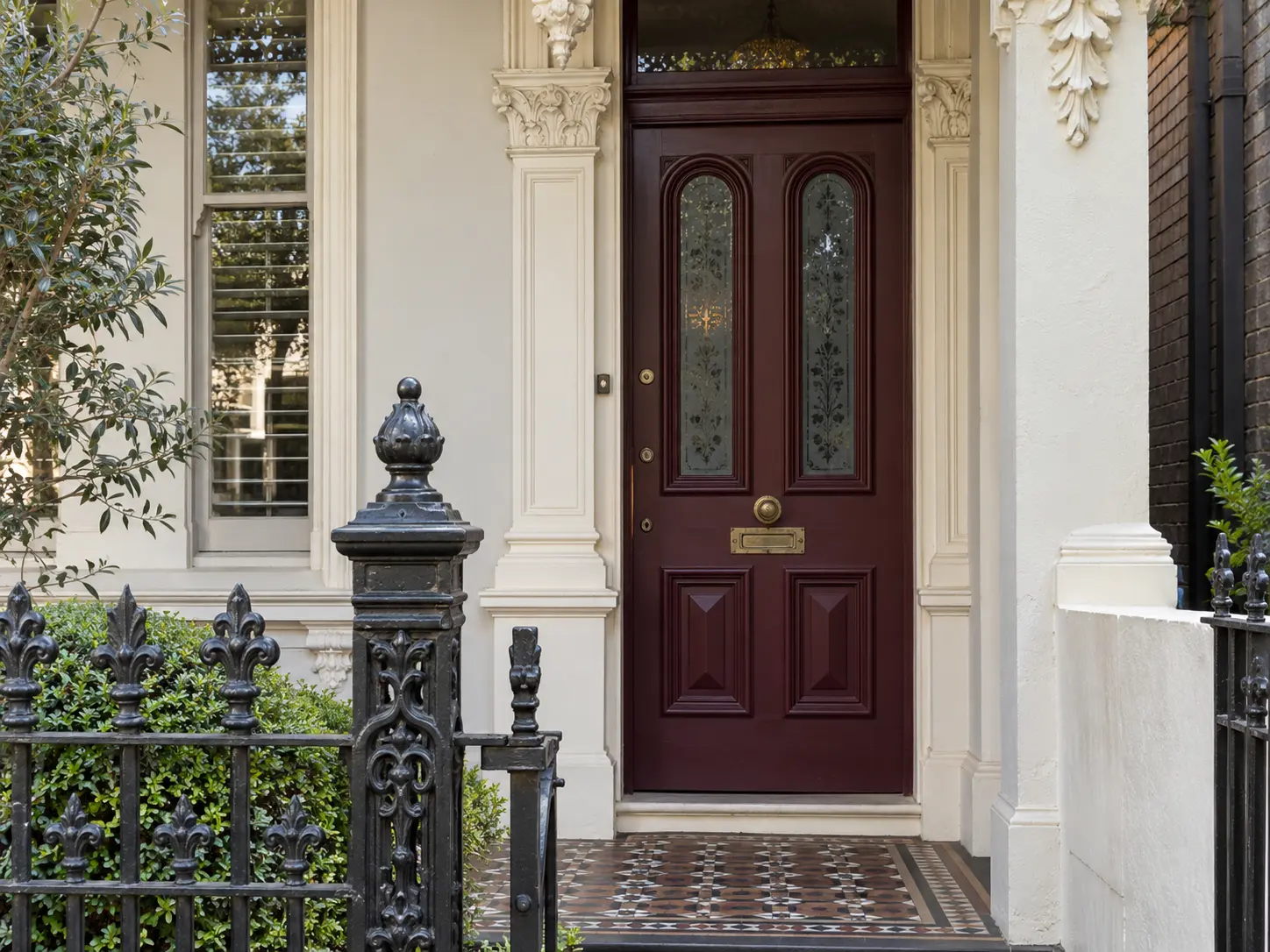 burgundy front door on Victorian terrace house Melbourne